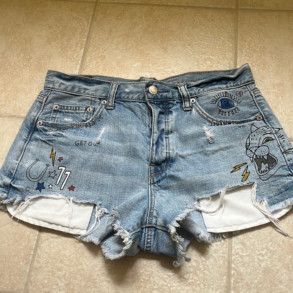 Denim cut off shorts with funky designs
